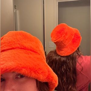 Orange fuzzy bucket hat